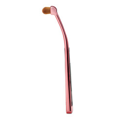 Rose gold cosmetic brush. High quality photo