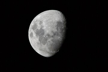 Closeup of bright three-quarter moon in Western Australia showing fine detail of lunar surface.