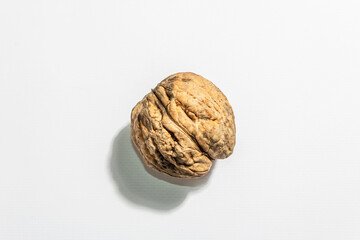 Single walnut isolated on white background