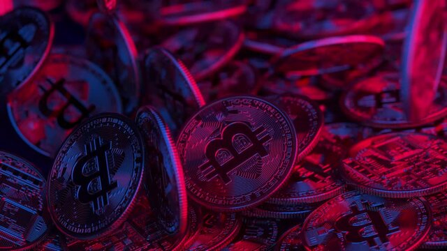 Neon glowing Bitcoin Cash (BCC) coin in Ultra Violet colors. Money futuristic network business concept. Digital background. Virtual reality, cyber. Coins fall on the table. 3d animation of 4K