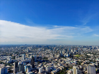 Fototapeta na wymiar High view of Bangkok against the summer sky.