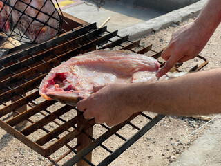 basra, Iraq - april 27, 2020:  photo fish grill in the street of basra city © Mohammed
