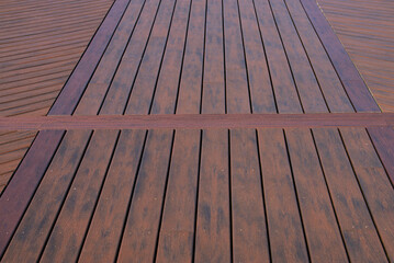 wooden sidewalk near the ocean plank clen