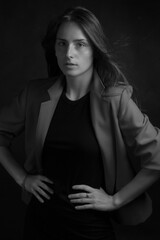 Naklejka premium Black and white portrait of a young girl with long hair