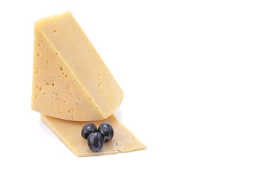 Solid yellow gouda cheese, close-up, isolated on a white background.selective focus.