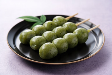 mugwort-flavored rice dumpling placed on a purple background
