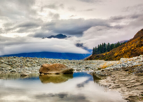 Reflections In A Rock Pool In The Clyde River In Summer With Almost No Water Near Erewhon Station, Ashburton NZ