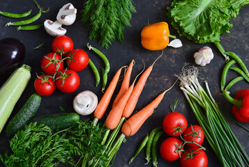 Various vegetables on a black background. Healthy food concept.
