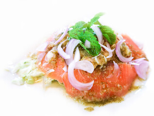Salmon spicy salad in Thai style on white background