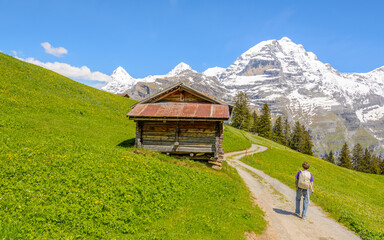 Crossing the Alps. Hiking trail in the Alps. Murren. Switzerland.