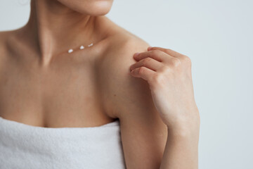 Fototapeta premium Pretty woman naked shoulders towels clean skin shower