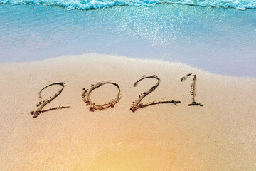 Happy New Year 2021 is coming concept sandy tropical ocean beach lettering