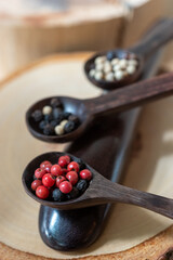 peppercorns on spoon