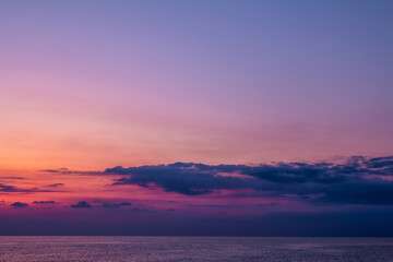 Scenic after-sunset crimson light on the sea