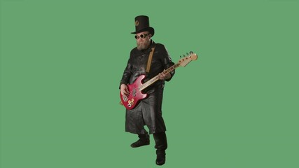 A bearded man in a long leather coat, an Irish style hat and original glasses plays the red guitar. Rock musician plays bass guitar in studio on green screen chroma key. Slow motion.