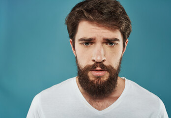 Sad man emotions white t-shirt cropped view close-up