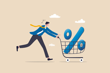 Fototapeta premium Shopping discount percentage, mortgage loan interest rate or investment earning and profit concept, businessman investor or consumer pushing shopping cart trolley with big percentage sign.