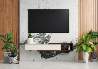 TV on the white marble wall, decorated with a wooden wall, behind the TV cabinet and potted plants on the tiled floor.3d rendering.