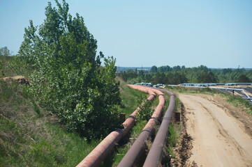 Pavlodar, Kazakhstan - 05.29.2015 : The pipe for ash removal runs along the territory of the...