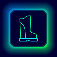 Glowing neon line Waterproof rubber boot icon isolated on black background. Gumboots for rainy weather, fishing, gardening. Colorful outline concept. Vector