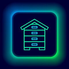 Glowing neon line Hive for bees icon isolated on black background. Beehive symbol. Apiary and beekeeping. Sweet natural food. Colorful outline concept. Vector