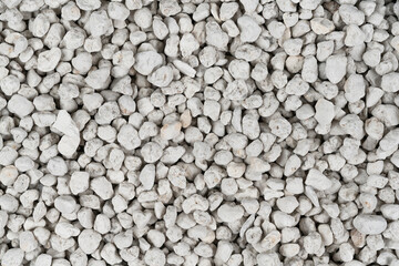 White pebbles background texture. Rock background. clay pebbles