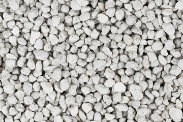 White pebbles background texture. Rock background. clay pebbles