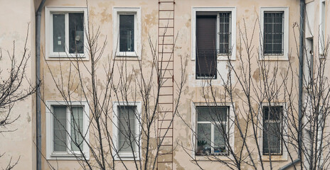 The facade of an old residential building.