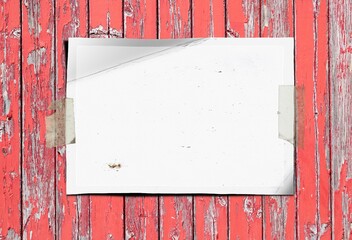 Mock up poster frame close up with tape on wall painted old used wooden background red pink color