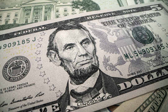 Macro shot of 5 US dollars banknote made in 2003. Abe Linkoln portrait