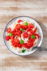 Konjac pasta with tomato sauce and basil, top shot