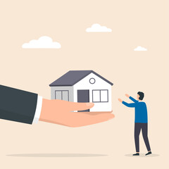 Real estate agent holds out a hand with a house in palm offering to buy it.