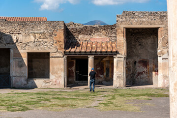 A photographer taking his photo at Pompey temple