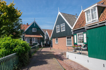 Fototapeta na wymiar Historical Houses At Marken City The Netherlands 6-8-2020