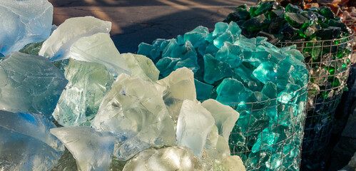Assortment of volcanic glass. Large cobblestones. Close-up, texture.