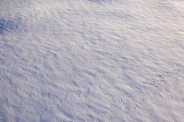 White fluffy snow, texture or background, top view.