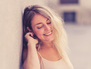 Fototapeta premium Young attractive woman looking sexy with fresh and natural beauty. Real People Outdoors Portrait