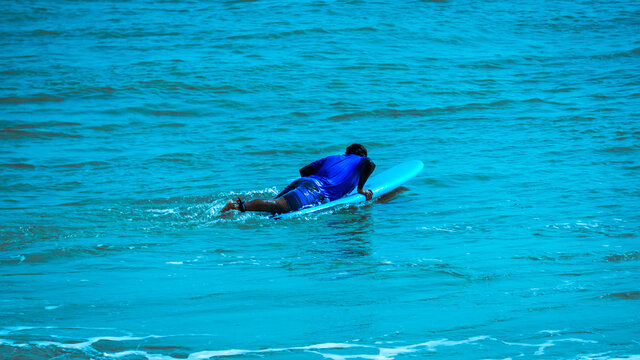 Extreme Sports and Action Photography - Picture of Surfer Man Surfing On Blue Ocean Wave, Kovalam Beach, Chennai, Tamilnadu, South India