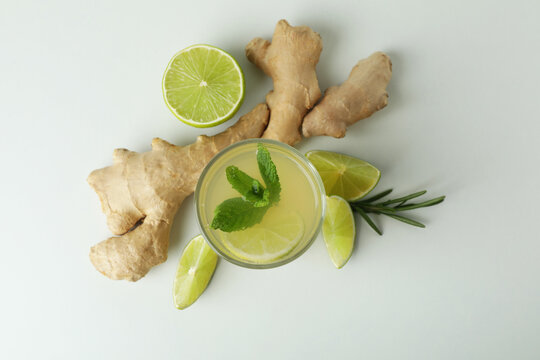 Glass Of Ginger Beer And Ingredients On White Background