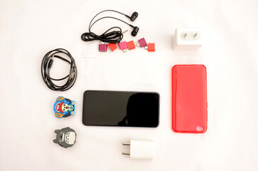 mobile with accessories air phone, ,ox wire,back cover,pug sui,d.i.y project concept on the white background.