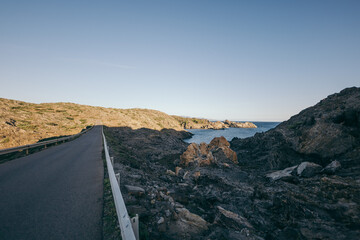 A sign on the side of a mountain