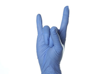 Hand in medical glove shows rock gesture, isolated on white background