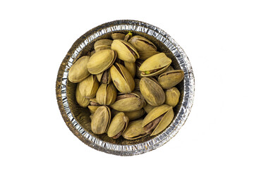 Pistachios in foil cup on a white background