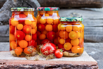 Tomatoes in a glass jar, homemade pickles