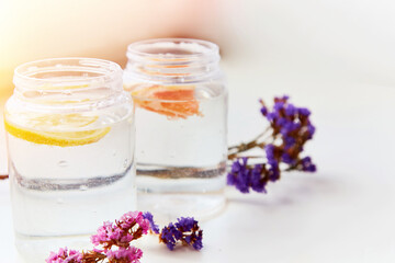 Hard seltzer with grapefruit and lemon. Homemade summer cocktails. Summer background,  copy space