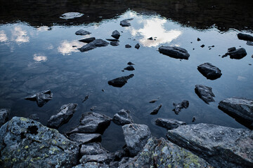 View of a lake into the mountain