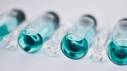 Medical ampoules for injection isolated on white background. Medicines and disease treatment, pharmacology and science concepts.