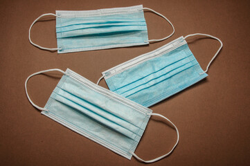 masks on brown background, coronavirus, epidemic