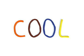 word cool made of colored plasticine isolated on white