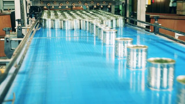 Factory transportation of sealed tin cans